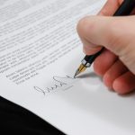 person signing contract