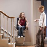 child using stair lift