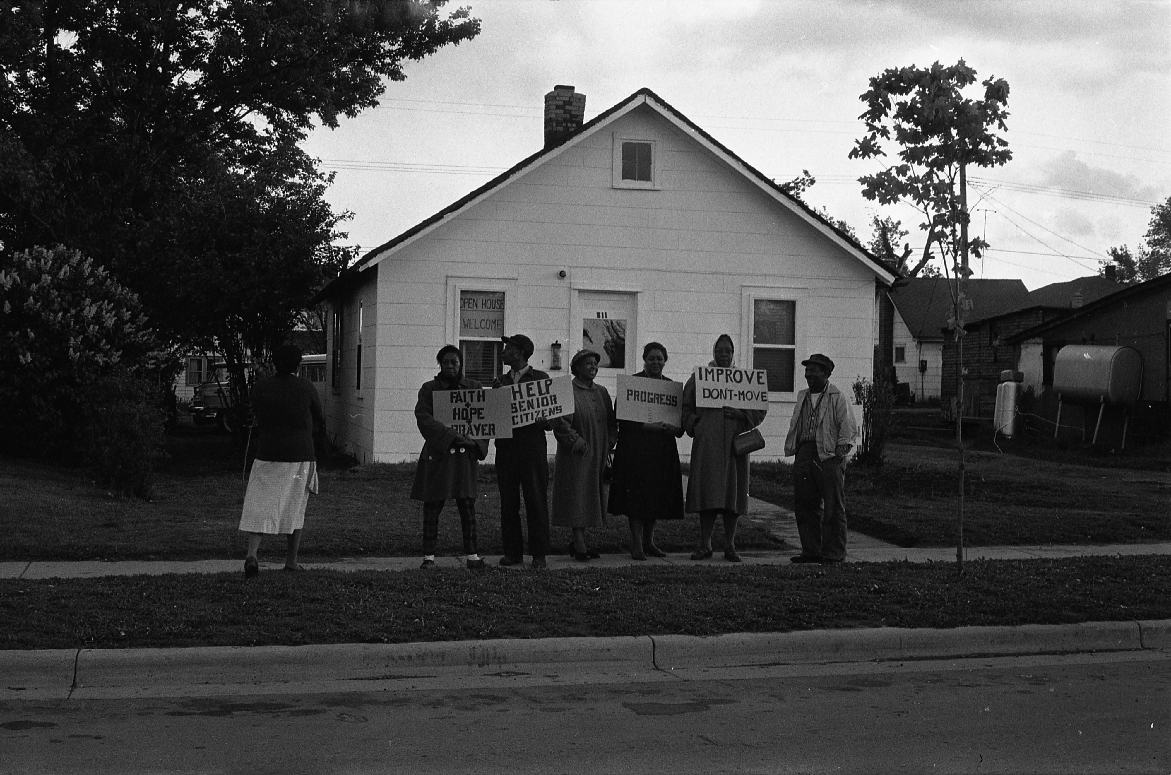 Protest in front of Ypsilanti Urban Renewal office, 811 Madison. Ann Arbor News May 27, 1961. From Ann Arbor District Library newspapers collections.