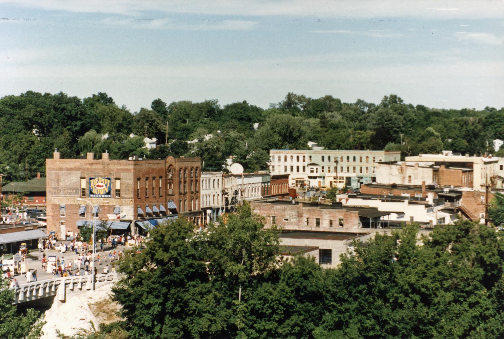 A distance photograph looking east at the Depot Town Festival during the summer of 1986.