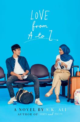 Love from A to Z. Two characters sit 2 seats away from each other at an airport.