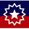 The Juneteenth Pride Flag. The top half of the flag is royal blue; the bottem red. the colors meet in an arc, symbolizing the horizon. There is a 12-point star that surrounds a 5-point star in the center.