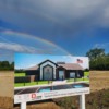 A double rainbow arches over the