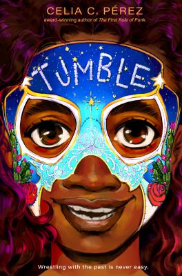 Tumble by Celia C. Perez. The book cover is the smiling face of a girl wearing a brightly-colored wrestling mask. The mask has roses, stars, and a blue ombre background.