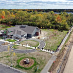 An aerial view of the new Superior Branch during the October 8 Book Brigade. Patrons are passing materials in a line from the old Superior Branch to the new one.