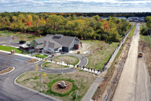 An aerial view of the new Superior Branch during the October 8 Book Brigade. Patrons are passing materials in a line from the old Superior Branch to the new one.