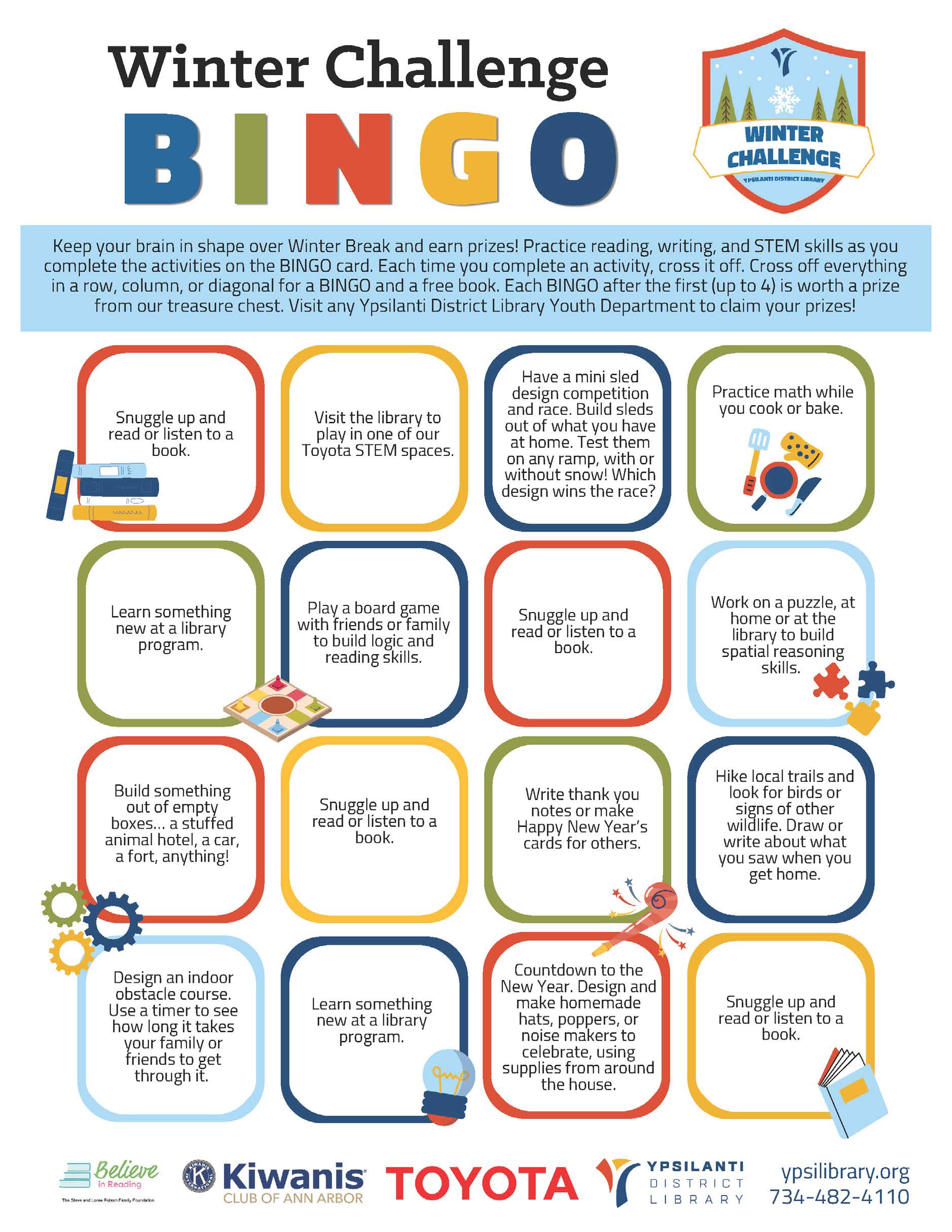 Lounge in the library with red chairs and a white table and a decorative wall in the background.